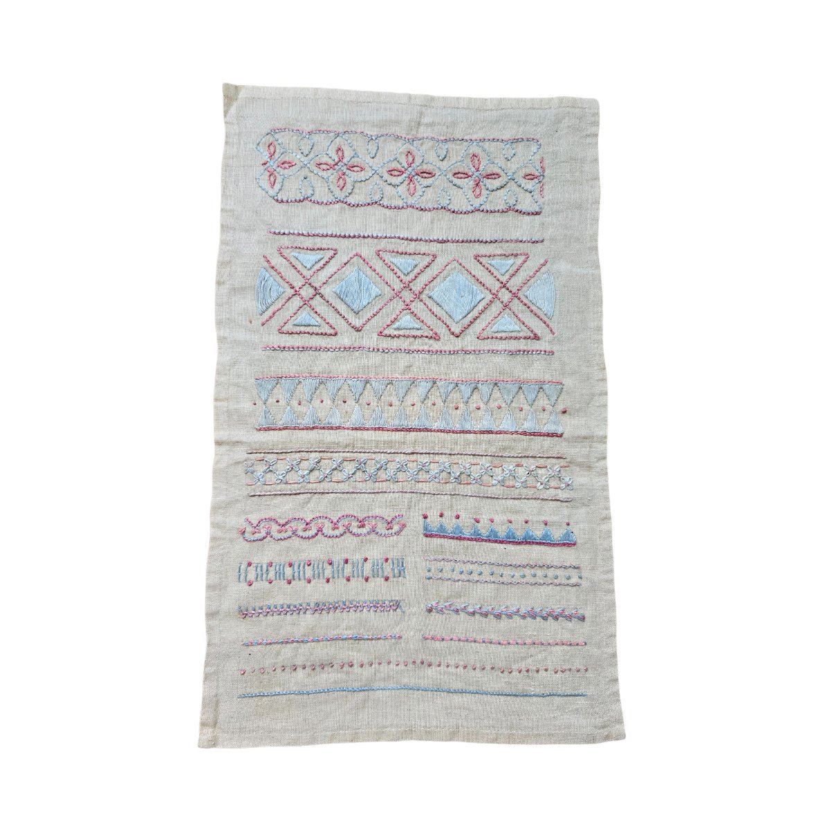 Rare and unusual embroidery sampler in blue and pink