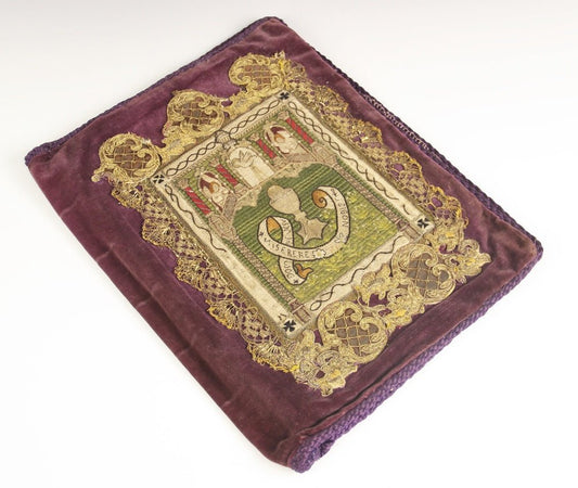 An 18th century embroidered applique Bible Cover depicting the sacrament
